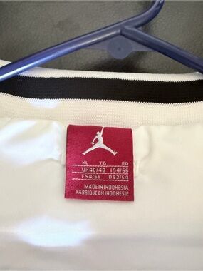 Jordan White Jacket with Black Collar Stripe and Red Jumpman Tag